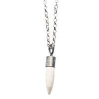 WHITE CROCODILE TOOTH