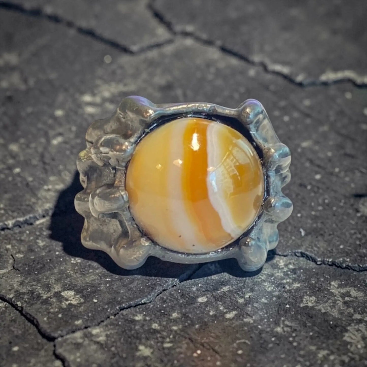 SKULL HAND STONE RING