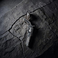 CARVED REVOLVER