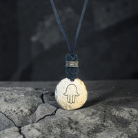 LEATHER AMULET CIRCLE HAMSA HAND