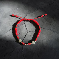 BEADS AND FLOWER RED STONE BRACELET