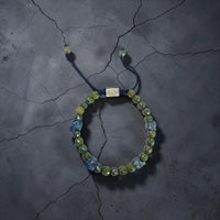5 SKULLS GREEN PIRITE BRACELET
