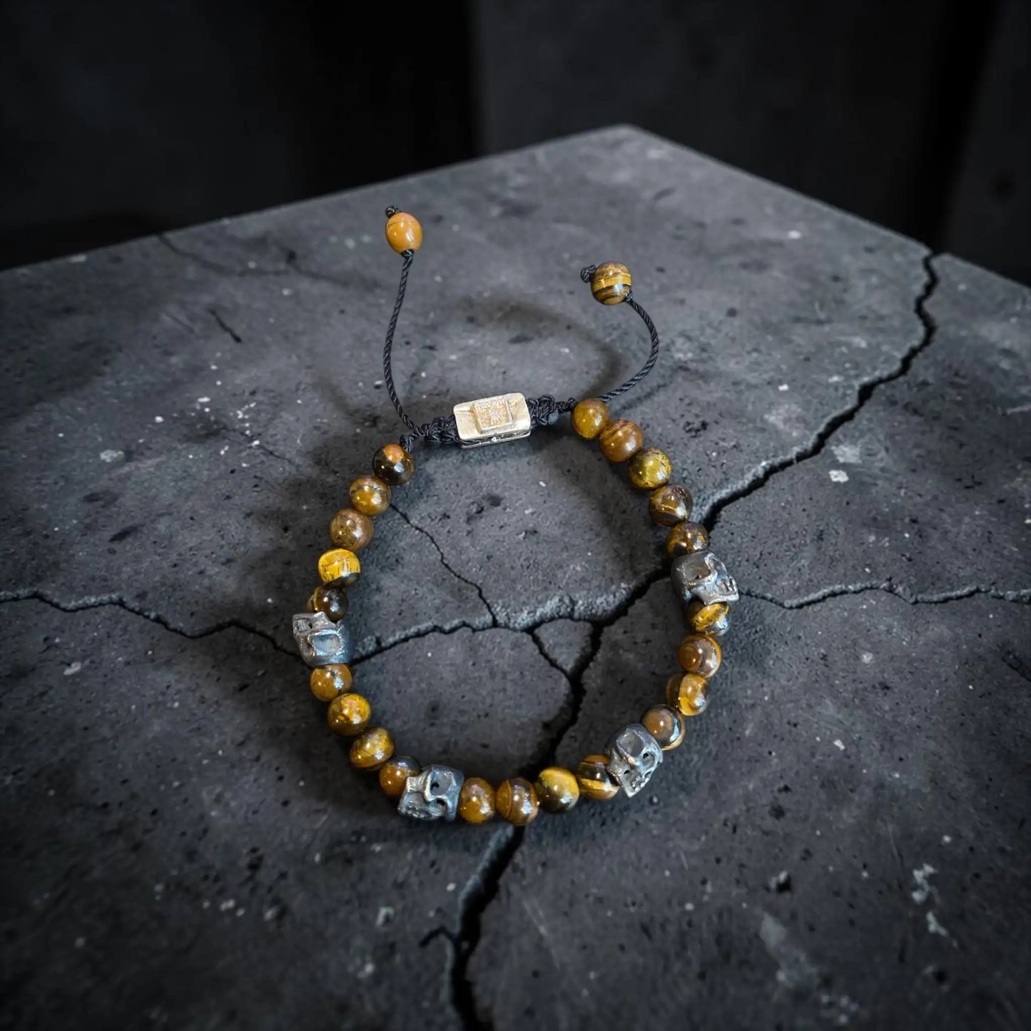 5 SKULLS TIGER EYE BRACELET