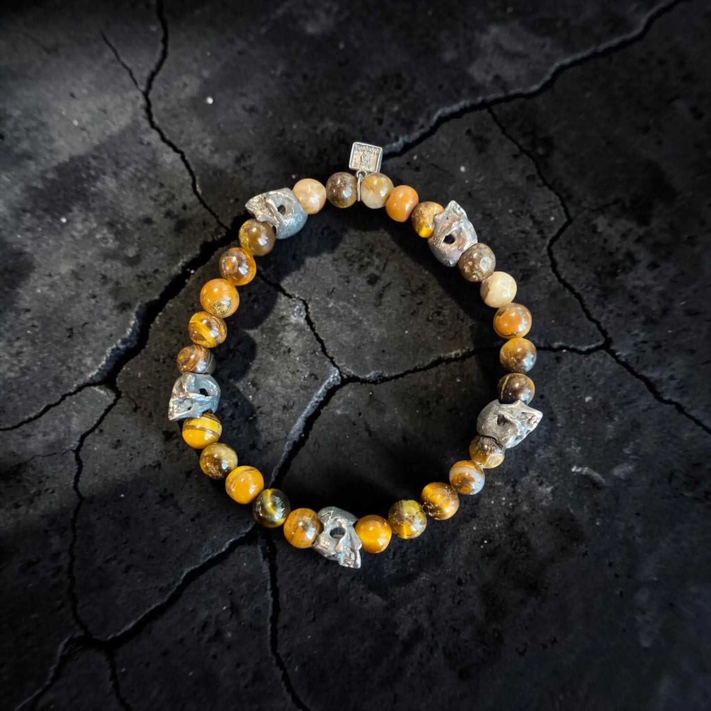 5 SKULLS TIGER EYE ELASTIC