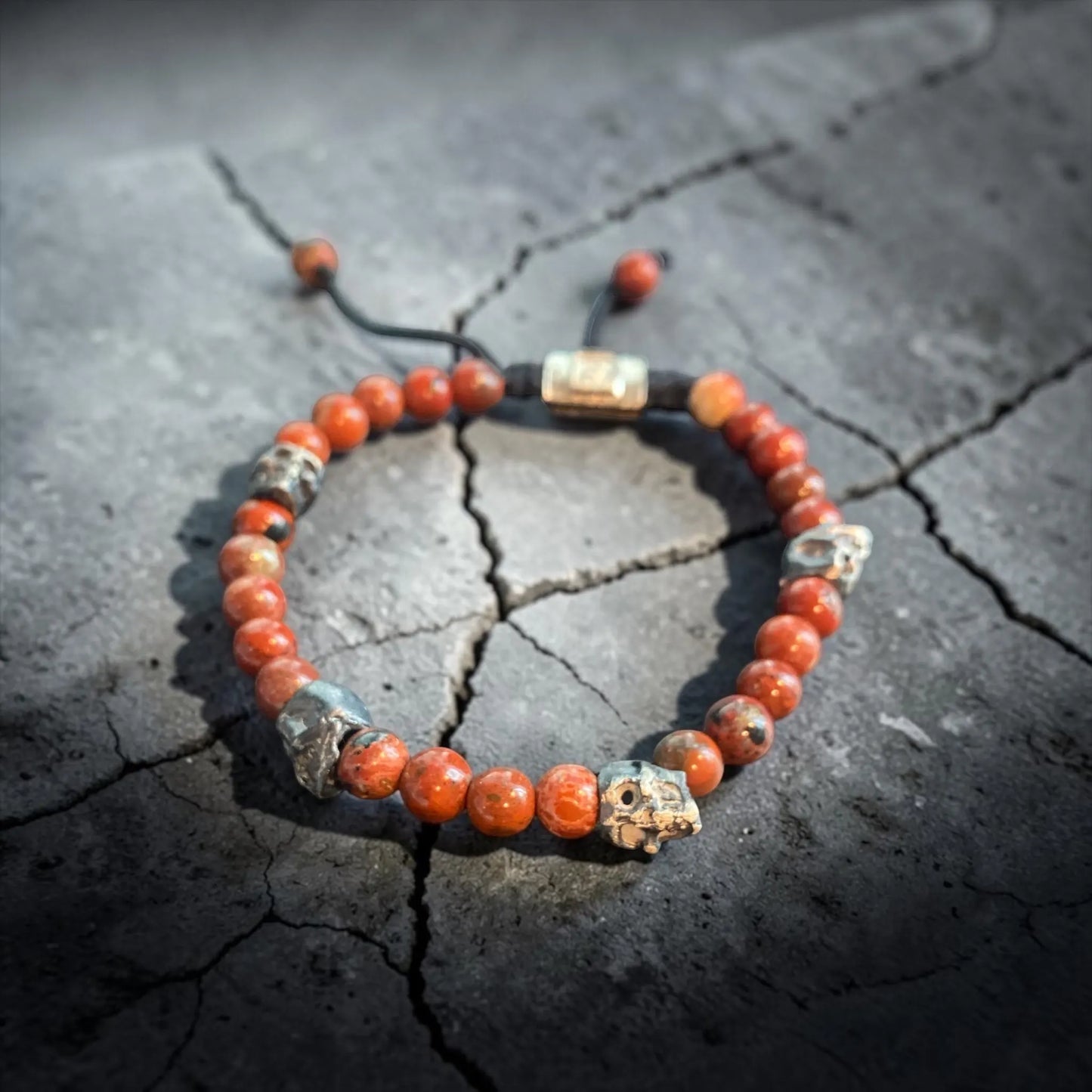 5 SKULLS JASPE NARANJA
