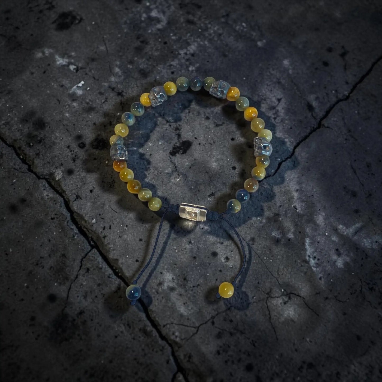 5 SKULLS GOLDEN TIGER EYE