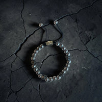 5 SKULLS WHITE HEMATITE BRACELET