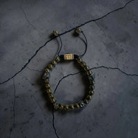 5 SKULLS ROUND PIRITE BRACELET
