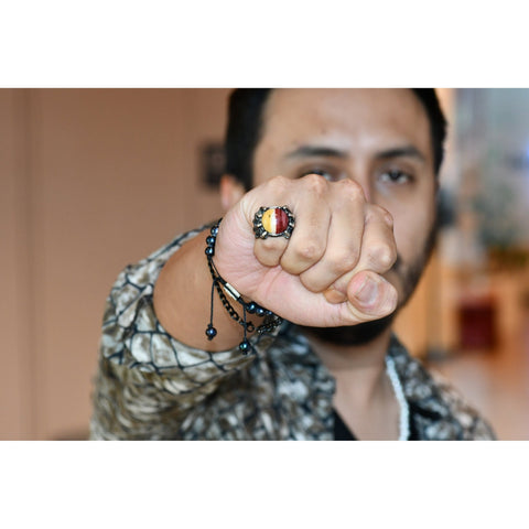 SKULL HAND STONE RING