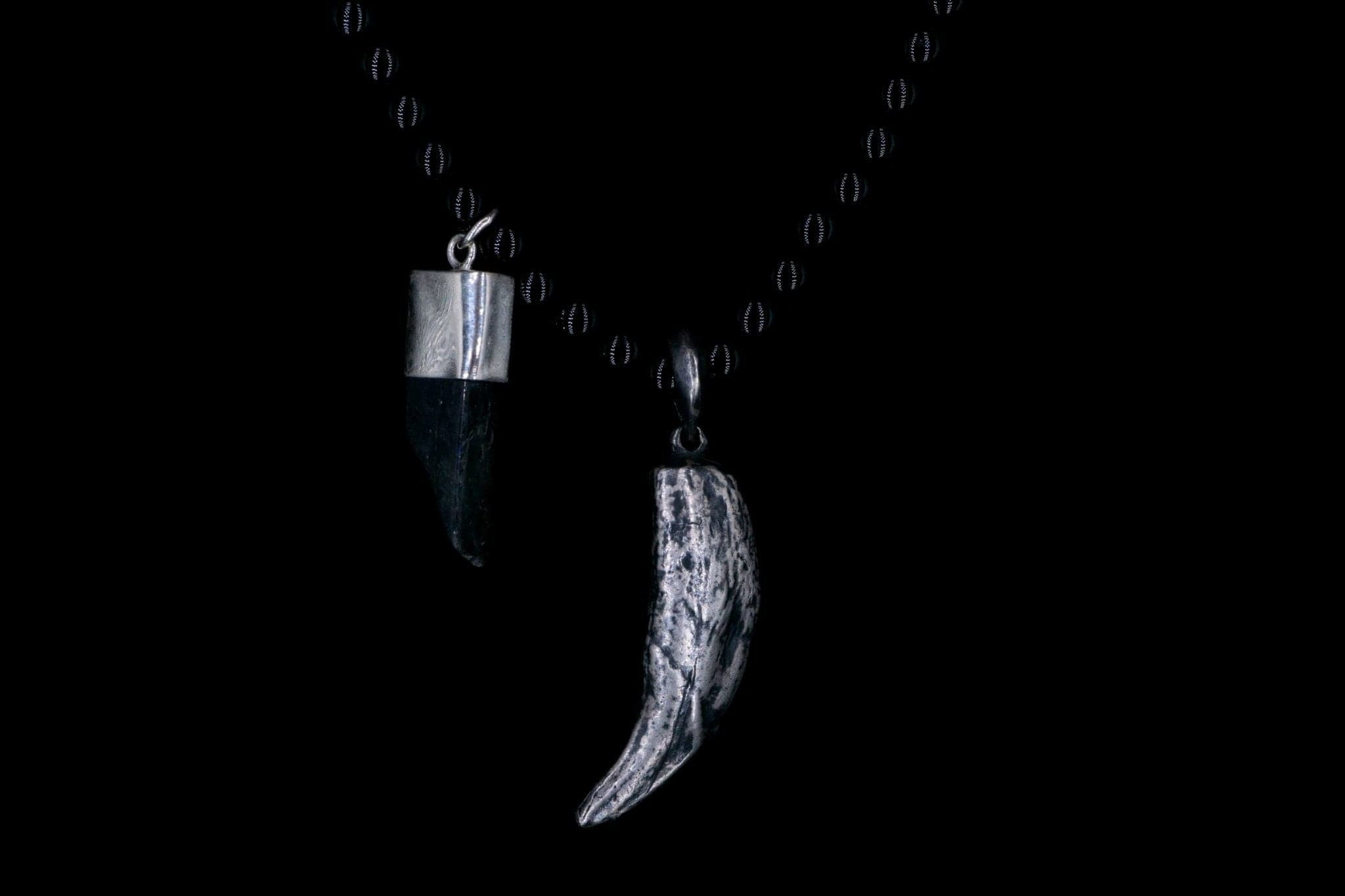OBSIDIAN WOLF TUSK NECKLACE