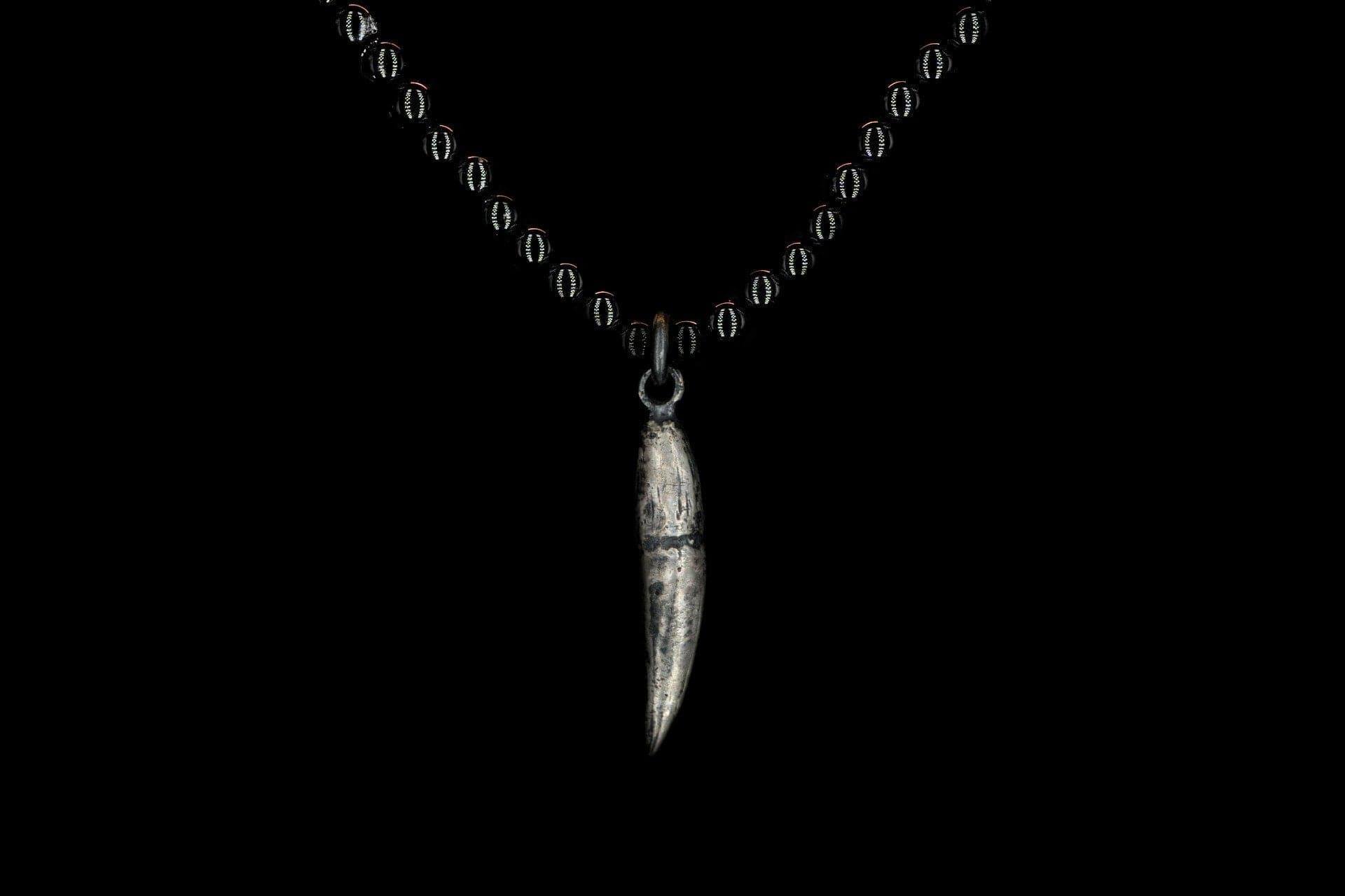 SMALL OBSIDIAN CAT TUSK NECKLACE